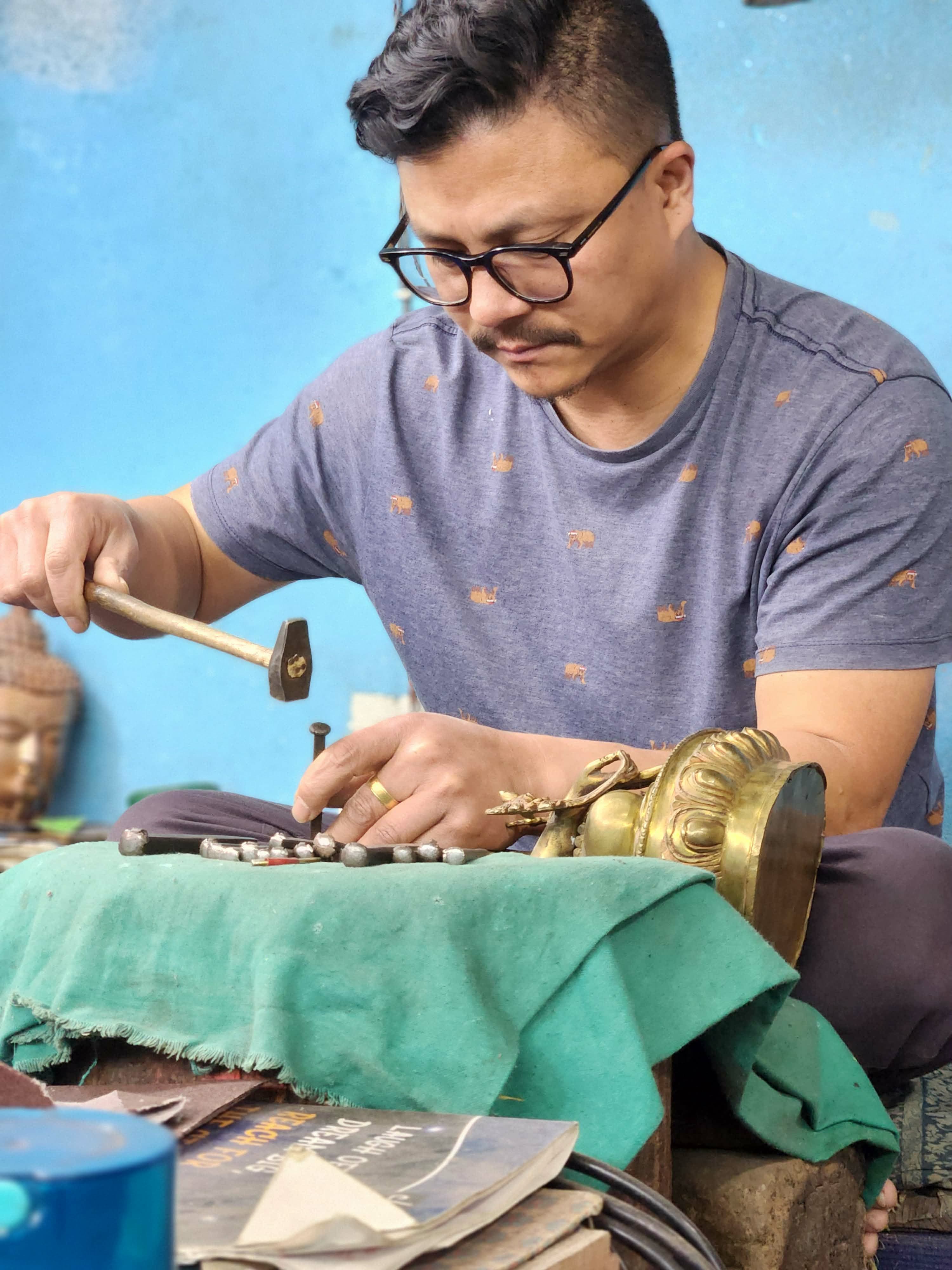 Hand-finishing a statue